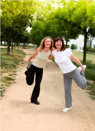 iStock- girls in park stretching