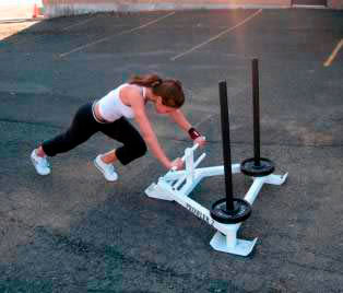 woman dragging sled